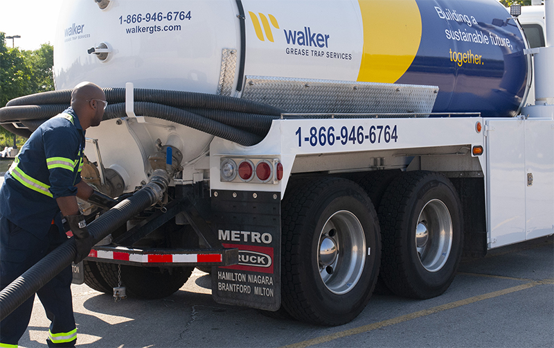 Photo of grease trap vacuum truck.